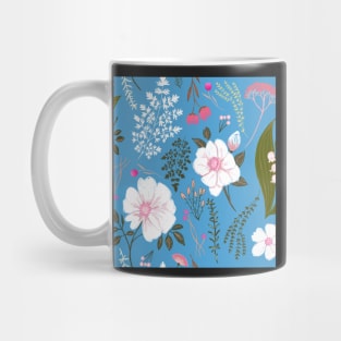 Garden florals and herbs on blue Mug